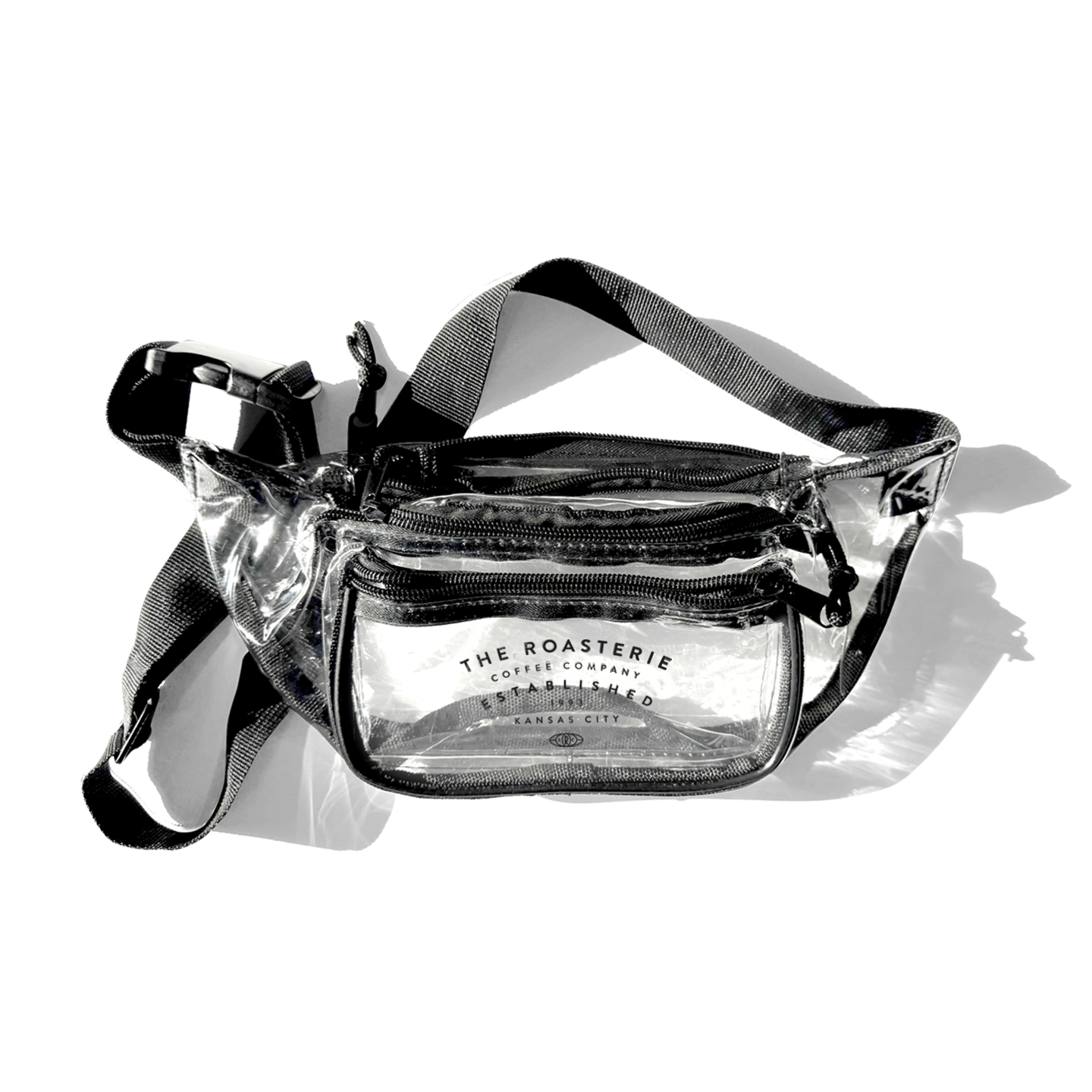 Roasterie Clear Fanny Pack with three zippered compartments and adjustable strap, perfect for stadiums and festivals.