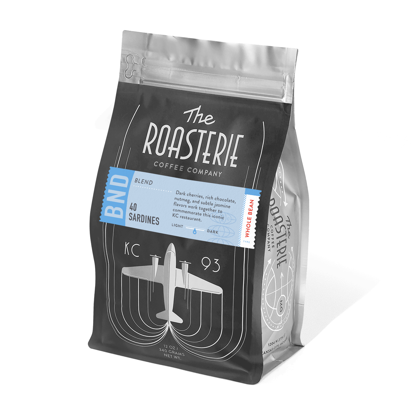 40 Sardines coffee blend bag by The Roasterie featuring dark cherries, chocolate, nutmeg and jasmine notes. Black packaging with retro airplane design and blue accent label showcasing KC 93 branding and tasting description.