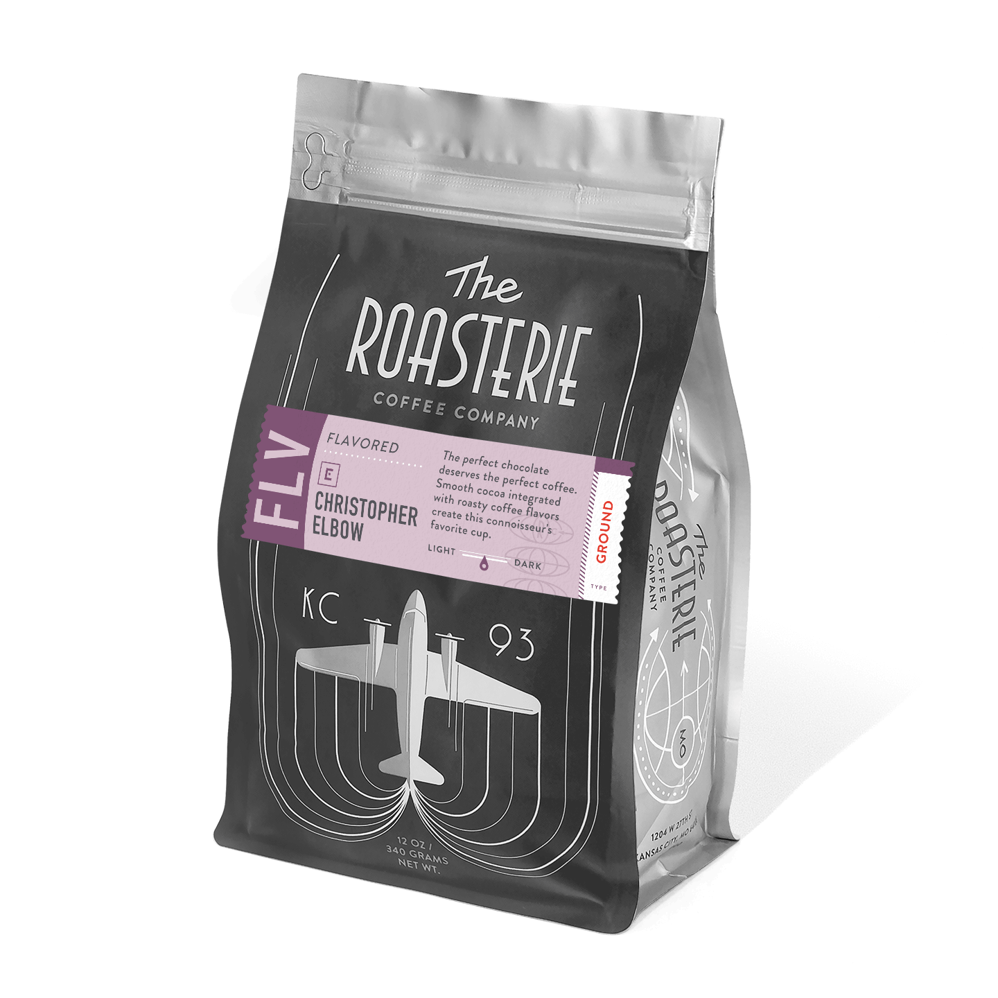 Christopher Elbow Cafe au Chocolat coffee bag from The Roasterie featuring a black package design with purple accents and vintage aircraft illustration, showcasing premium coffee blend with cocoa notes in resealable packaging